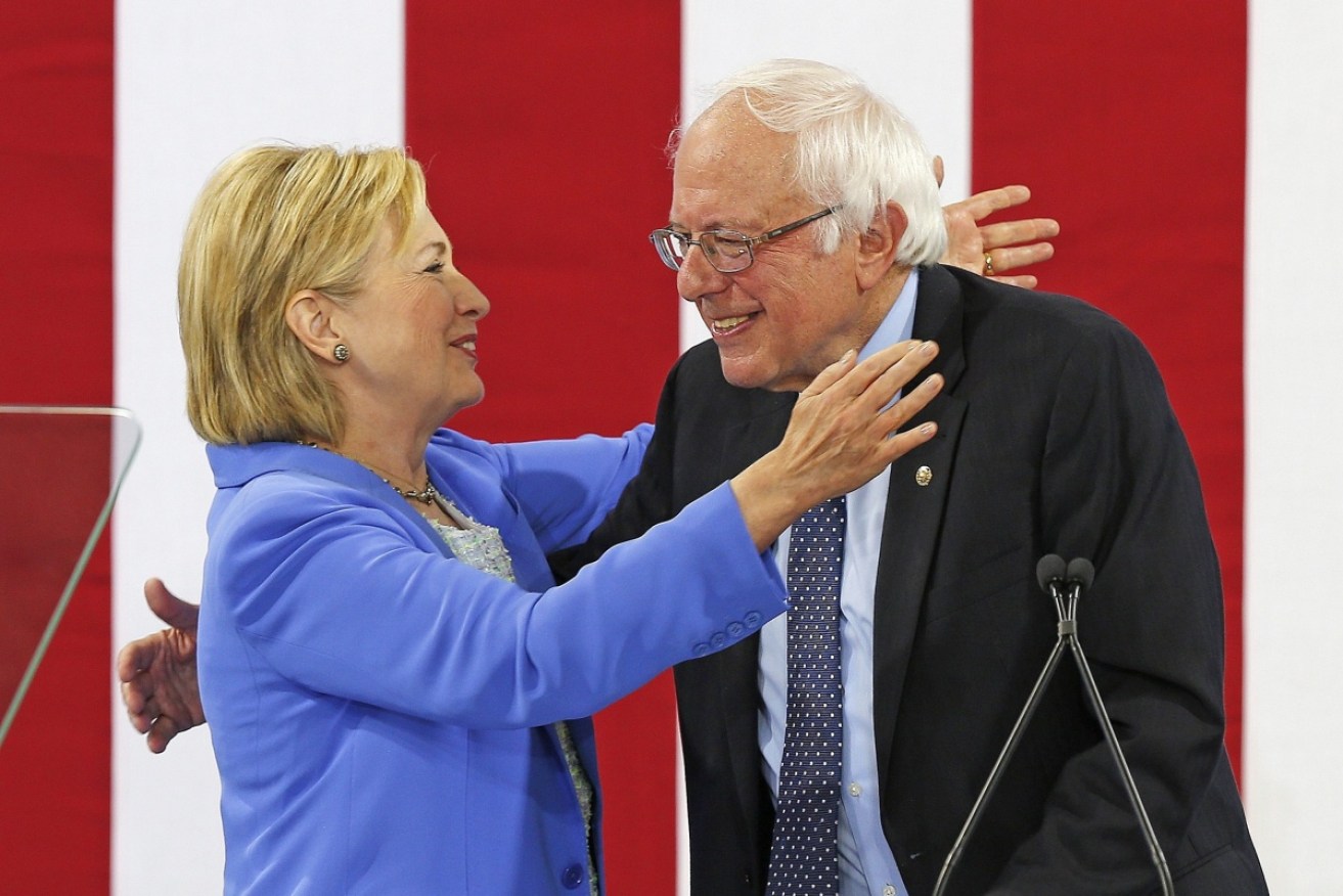  Hillary Clinton and former Democratic Presidential candidate Bernie Sanders at an event at Portsmouth High School in New Hampshire in July.
