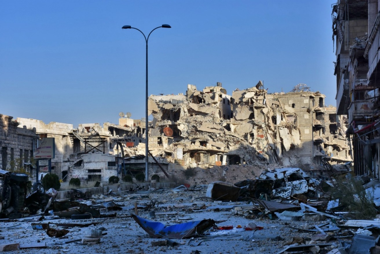Heavily destroyed buildings in the Bustan al–Basha neighbourhood in Aleppo, where pro–government forces have re–taken a third of rebel–held territory. 