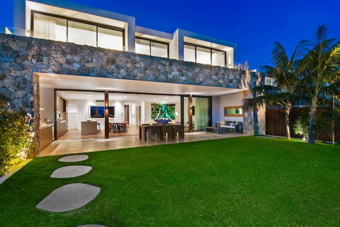 Mitchell Starc purchased former Miss Universe Jennifer Hawkins' home for over $5 million.