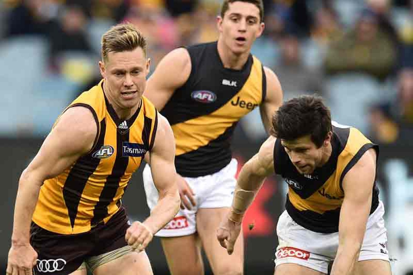 The AFL Commission has awarded Sam Mitchell and Trent Cotchin the 2012 Brownlow Medal.