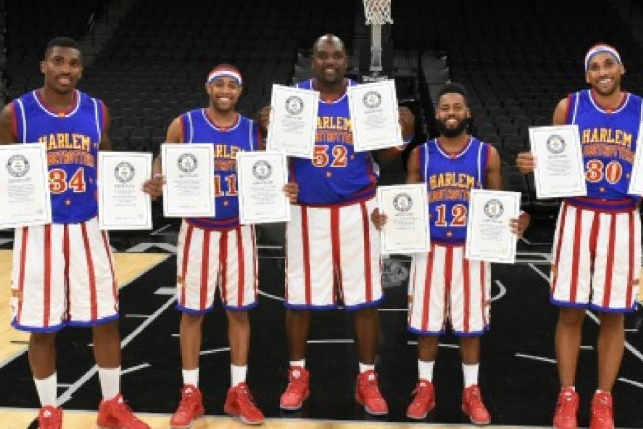 It all looks like just fun and games, but the Harlem Globetrotters can play a bit, too.