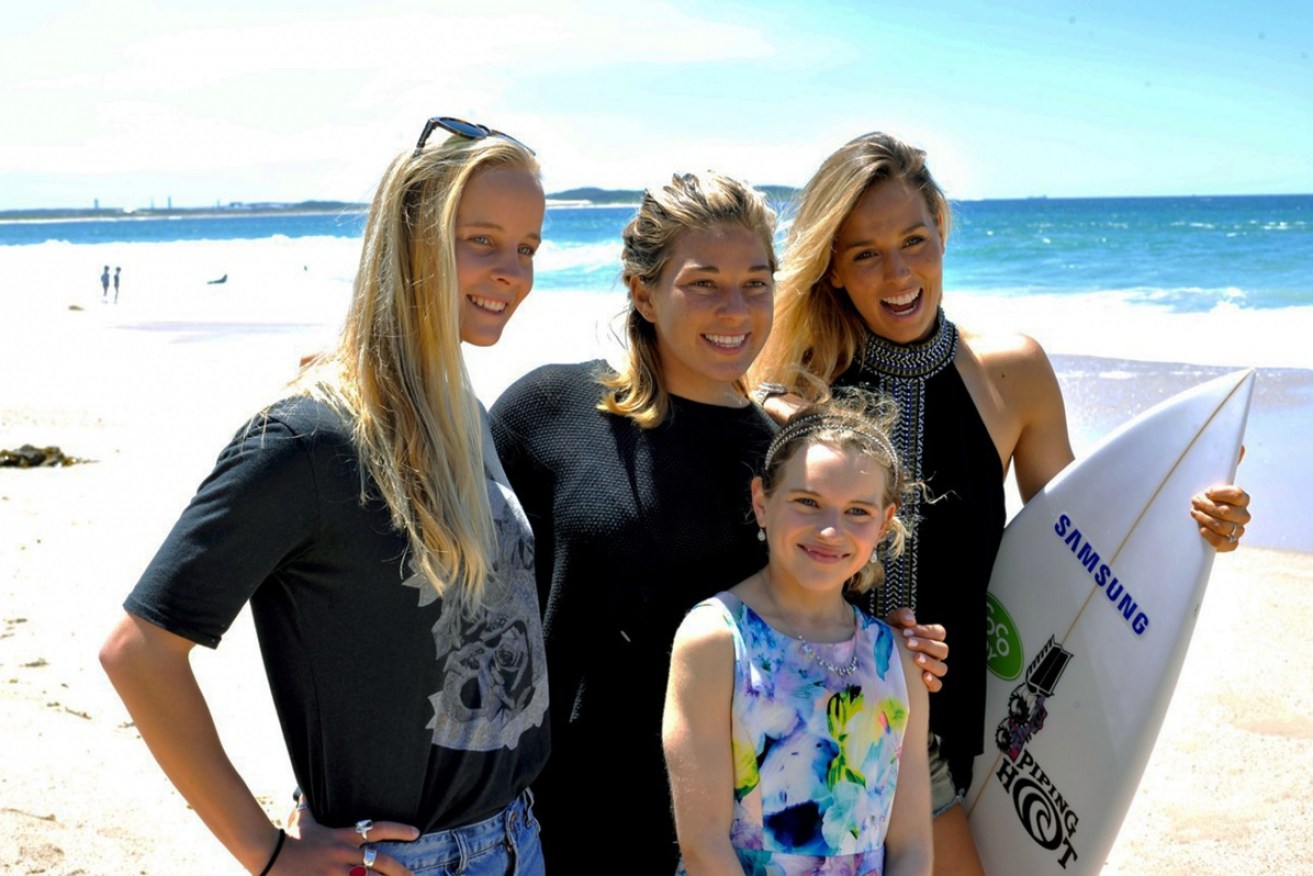 Sabre Norris (front) with (left to right) Australian Junior World Champion Isabella Nichols, Hawaiian surfer Coco Ho, and Australian World Surf League surfer Sally Fitzgibbons.