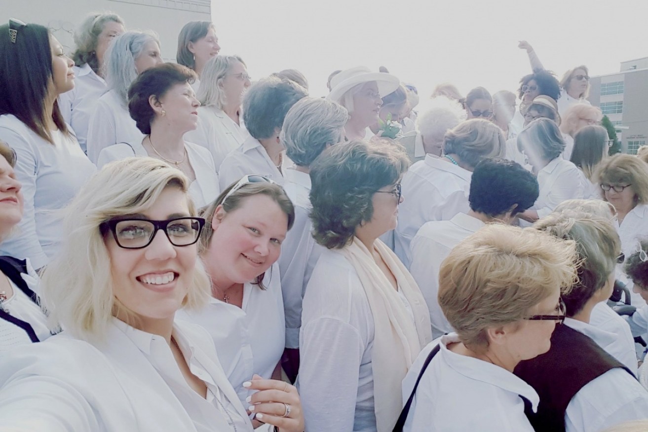 Female voters are turning up to the polls in a sea of white.