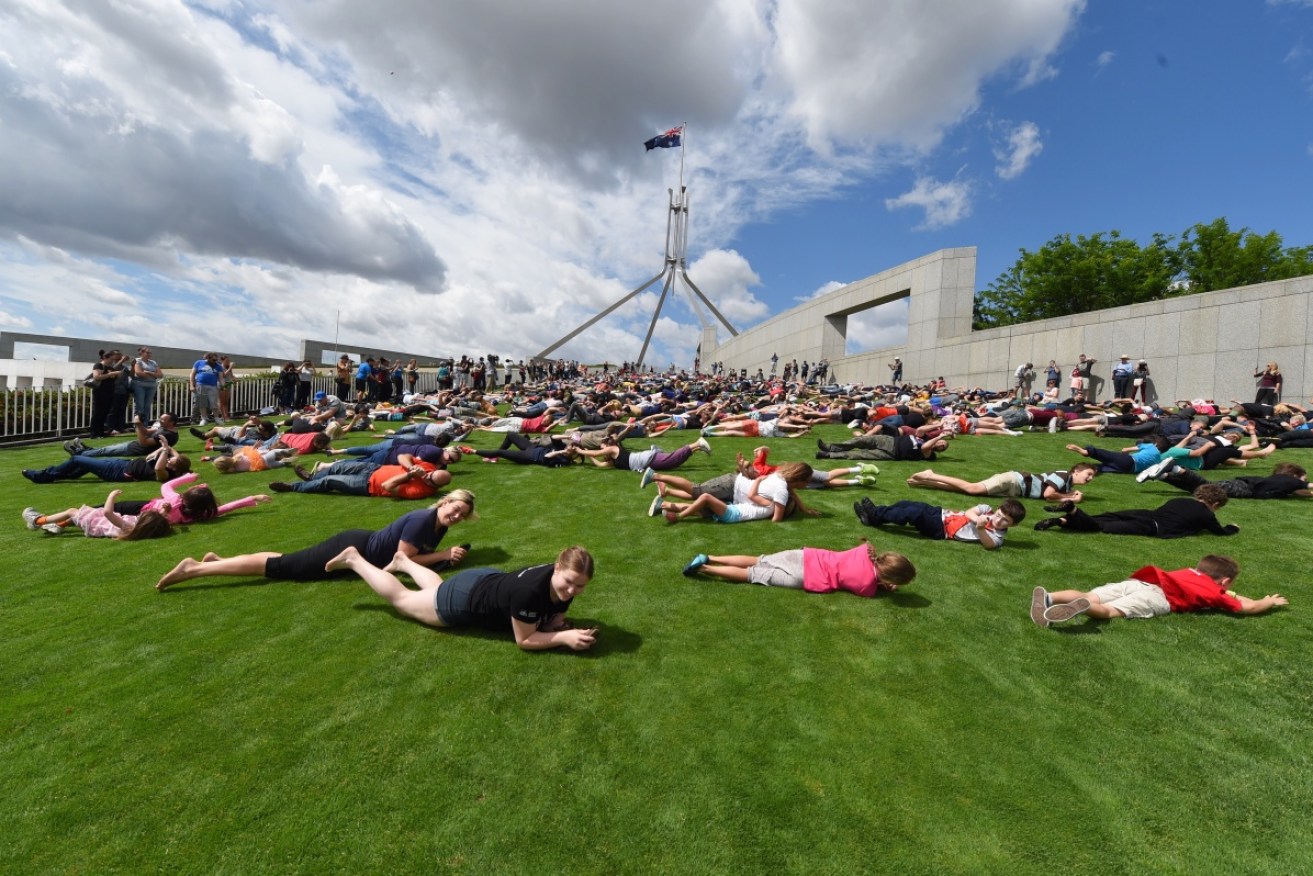 Hundreds gathered on the lawn at Parliament House in Canberra for one last roll earlier this year. 
