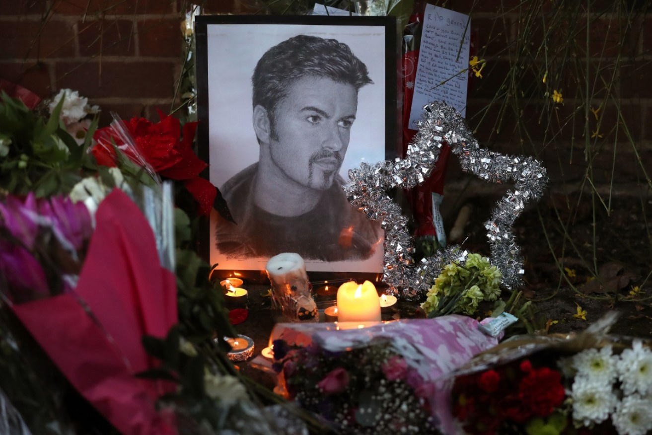 A floral tribute at George Michael's home  in Oxfordshire where the pop star was found dead in December.