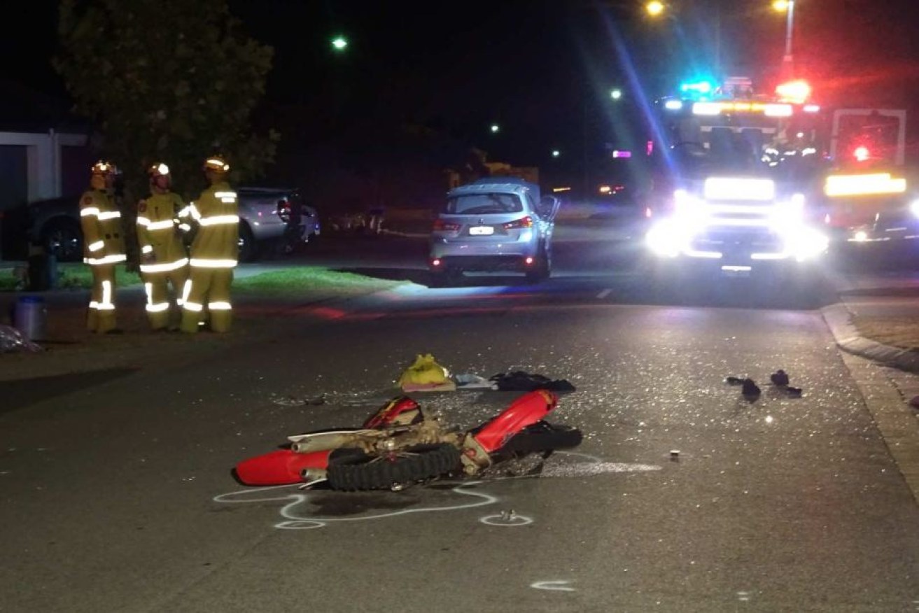 The boy's off-road bike collided with the car in the southern Perth suburb of Aubin Grove last night.
