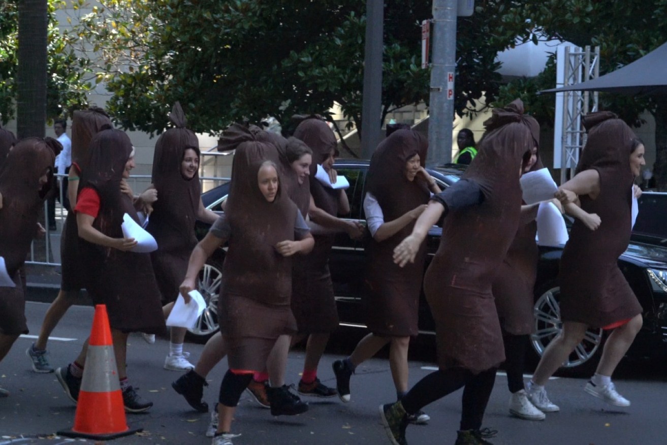 Members of WIFT storm the AACTA red carpet as sausages. 