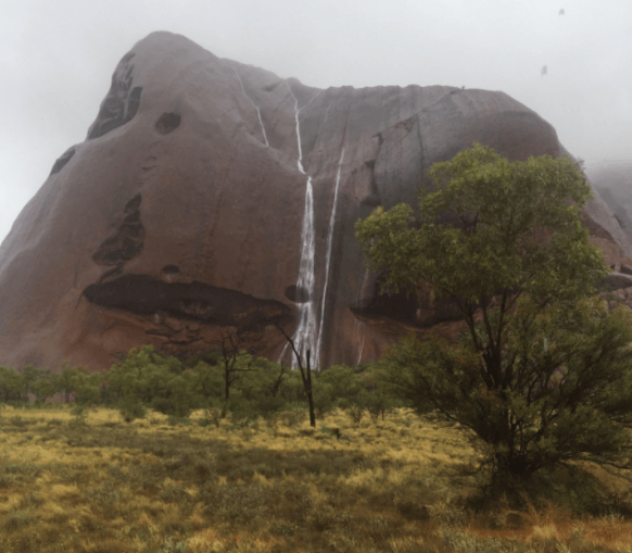 Uluru Storm Uluru puts on spectacular show after one-in-50-year rainfall