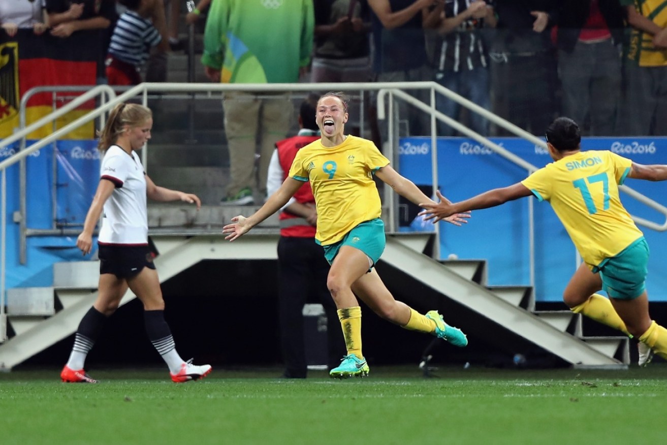 Caitlin Foord celebrates scoring a goal at the 2016 Olympics against Germany. 