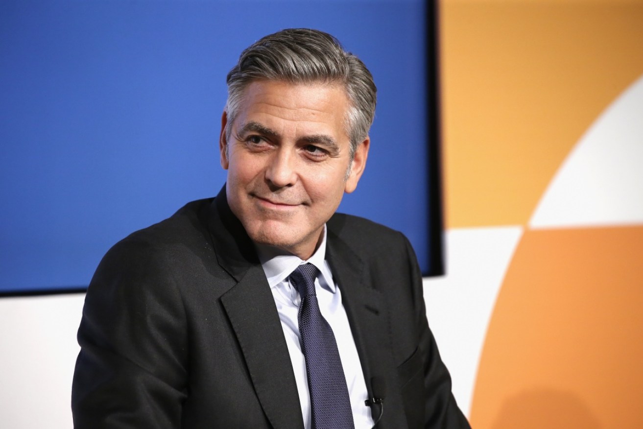 George Clooney says the issue of sexual harassment goes beyond Hollywood. 