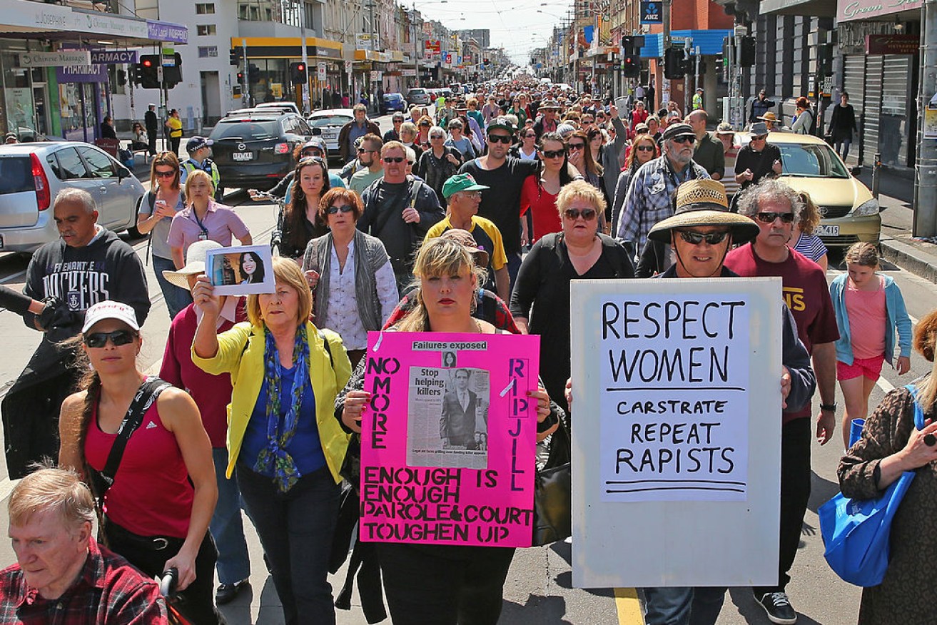 Protesters march down Sydney Road in 2012 after the rape and murder of Jill Meagher. 