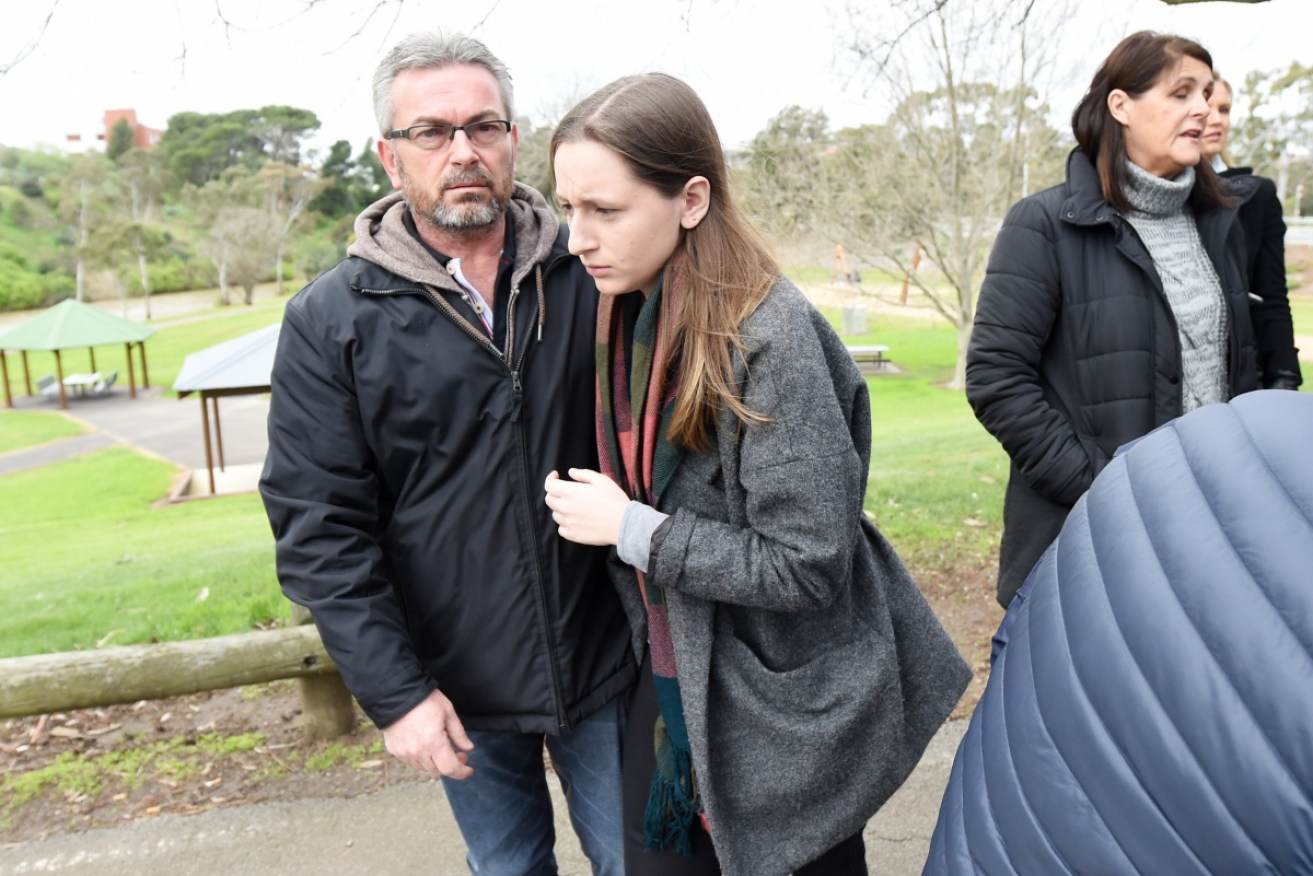 Borce Ristevski (centre right) the husband of missing Melbourne woman Karen Ristevski and their daughter, Sarah, at a press conference in mid July. 