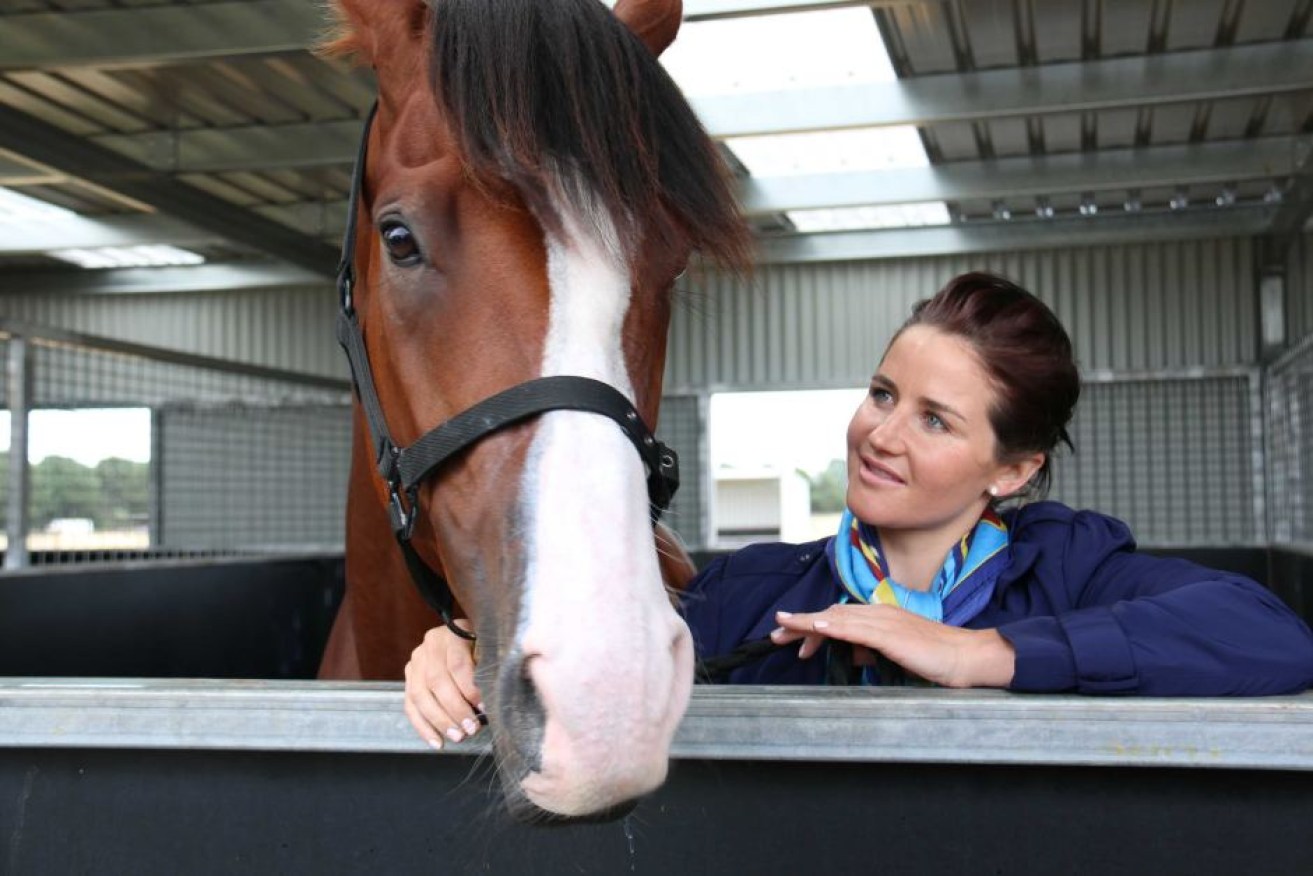 Michelle Payne with Duke of Nottingham – a horse she trained and rode to a race win. 