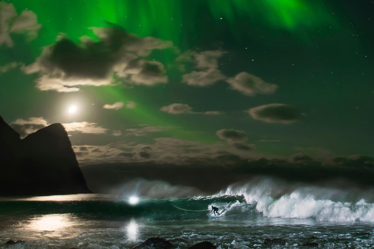 Mick Fanning veered away from championships last year, instead surfing under the northern lights in Norway. Photo: Red Bull