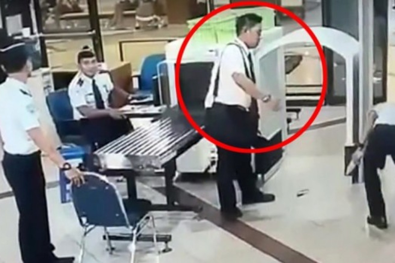 The Citilink Pilot bumbles and stumbles his way through the security check.