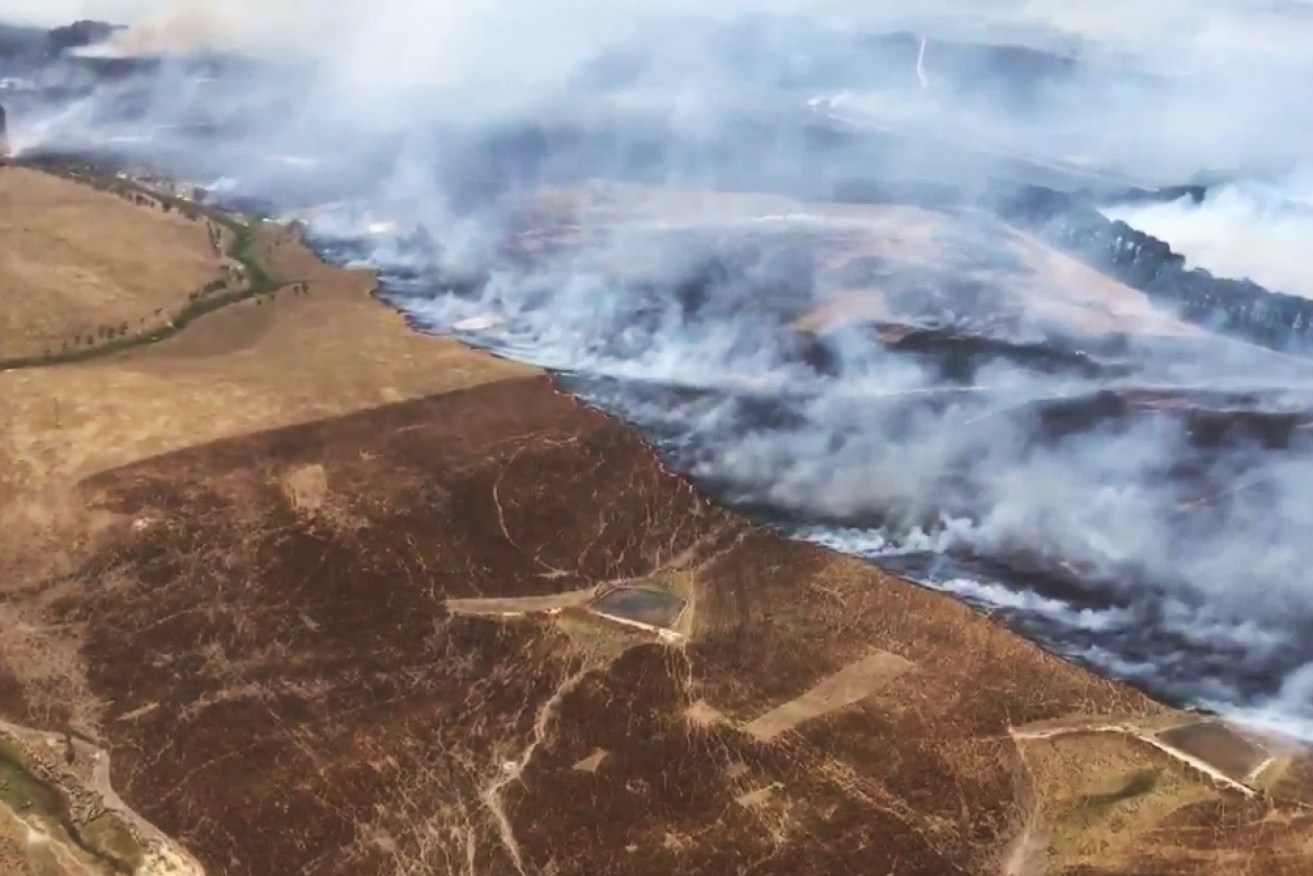 an aerial shot of a fire burning near Taylors Creek Road at Tarago. 