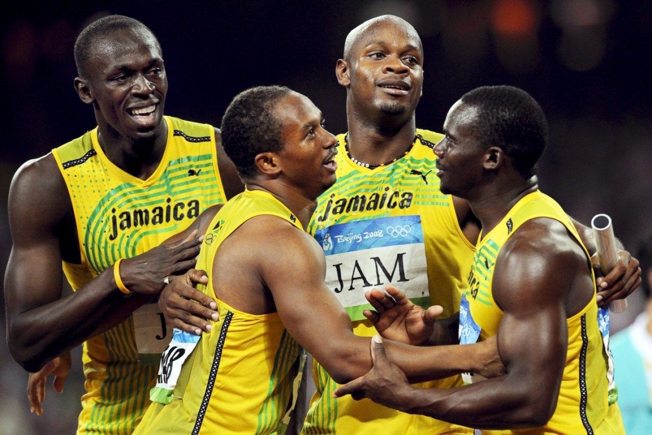 From left, Usain Bolt, Michael Frater, Asafa Powell and Nesta Carter celebrating after winning the men's 4x100m relay at the Beijing Olympics. 