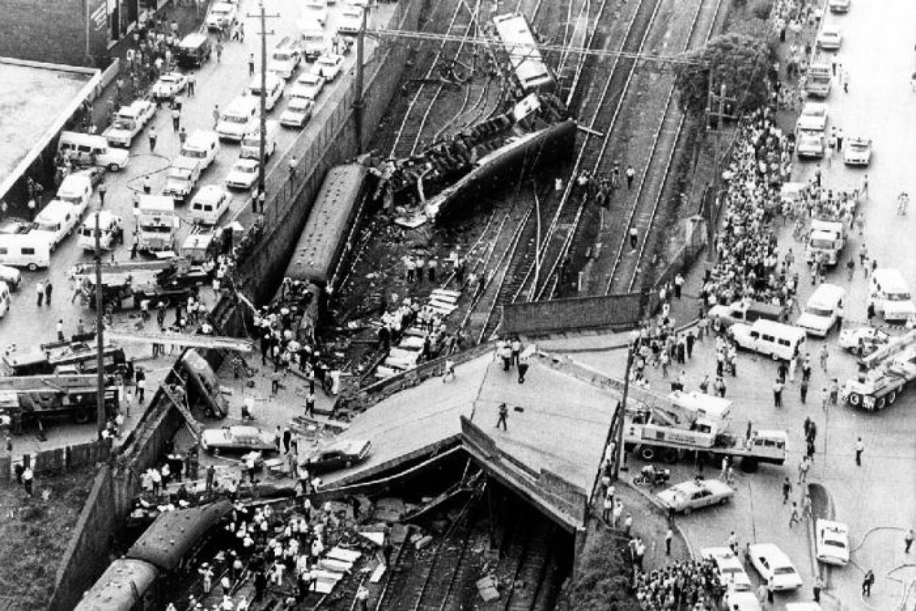 Eighty-three people died and 213 were injured when a commuter train derailed and a bridge collapsed in 1977.