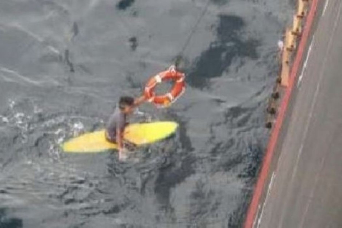 Some surfers like to paddle way out the back to catch a wave, but this Japanese surfer took things a little too far.