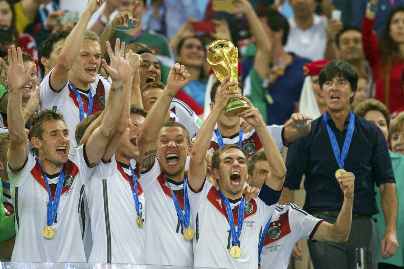 German players celebrate after winning the 2014 World Cup final against Argentina.