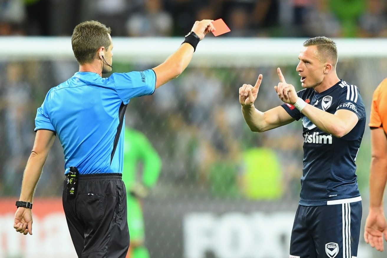 Besart Berisha sees red after the referee's decision to send him off against the Roar.
