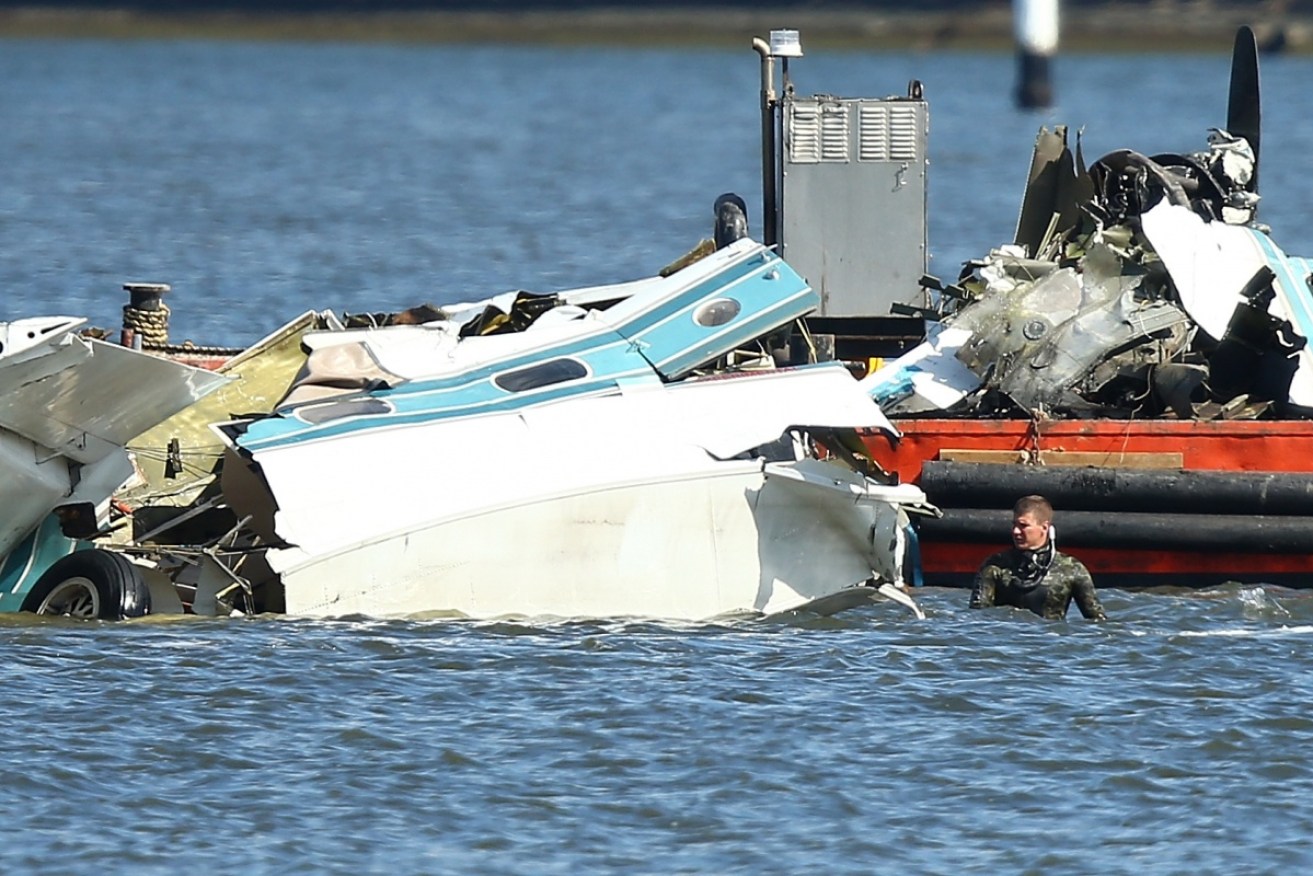 The wreckage of the sea plane that crashed on Australia Day is recovered from the Swan River.
