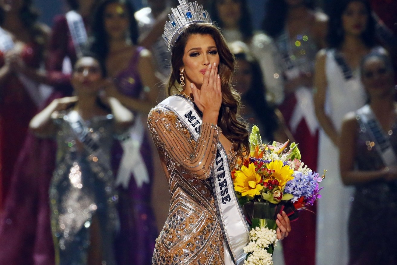 Iris Mittenaere blows kisses to the crowd after being proclaimed Miss Universe 2016.