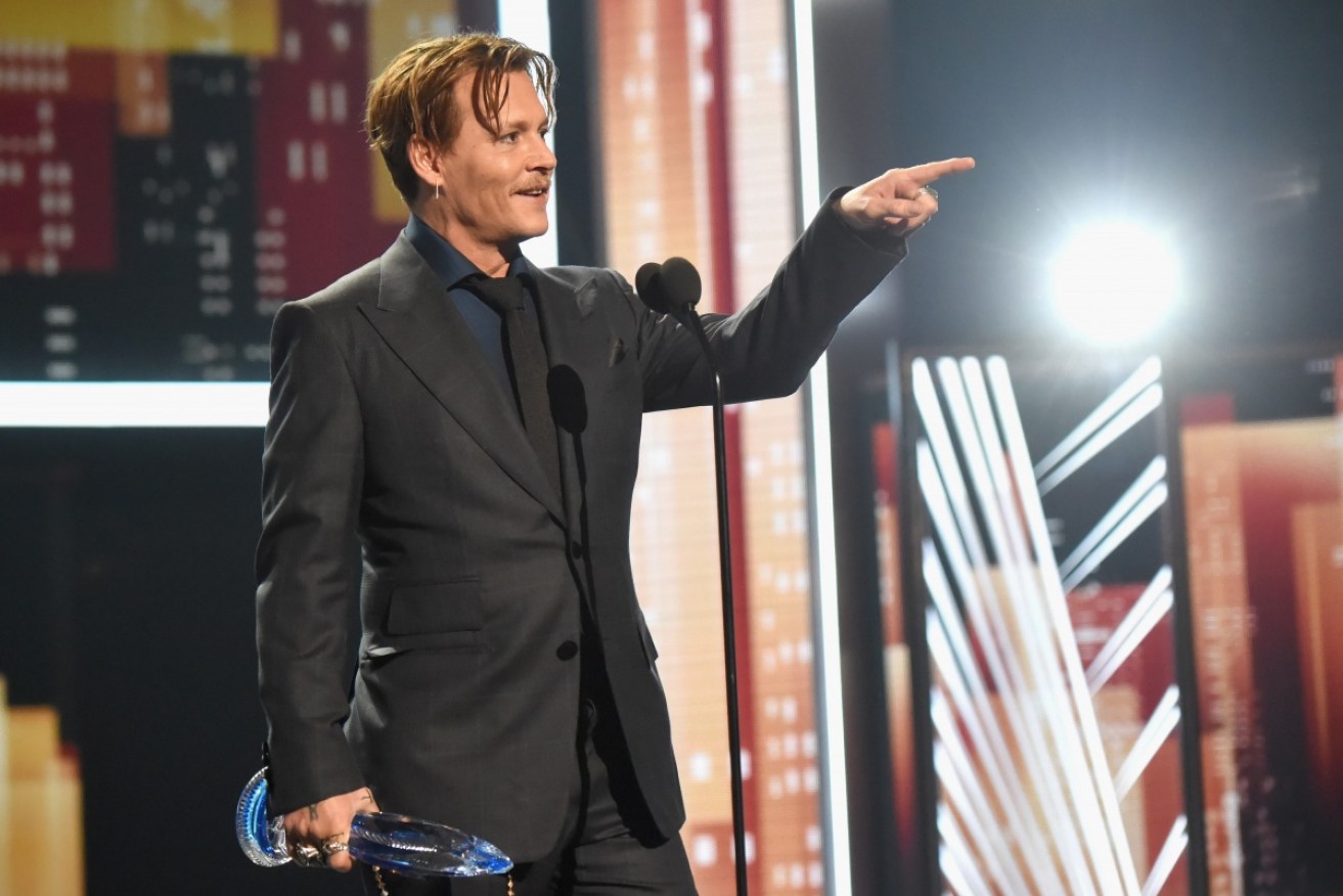 Johnny Depp thanks his fans as he accepts the 2017 People's Choice Award for favourite movie icon.