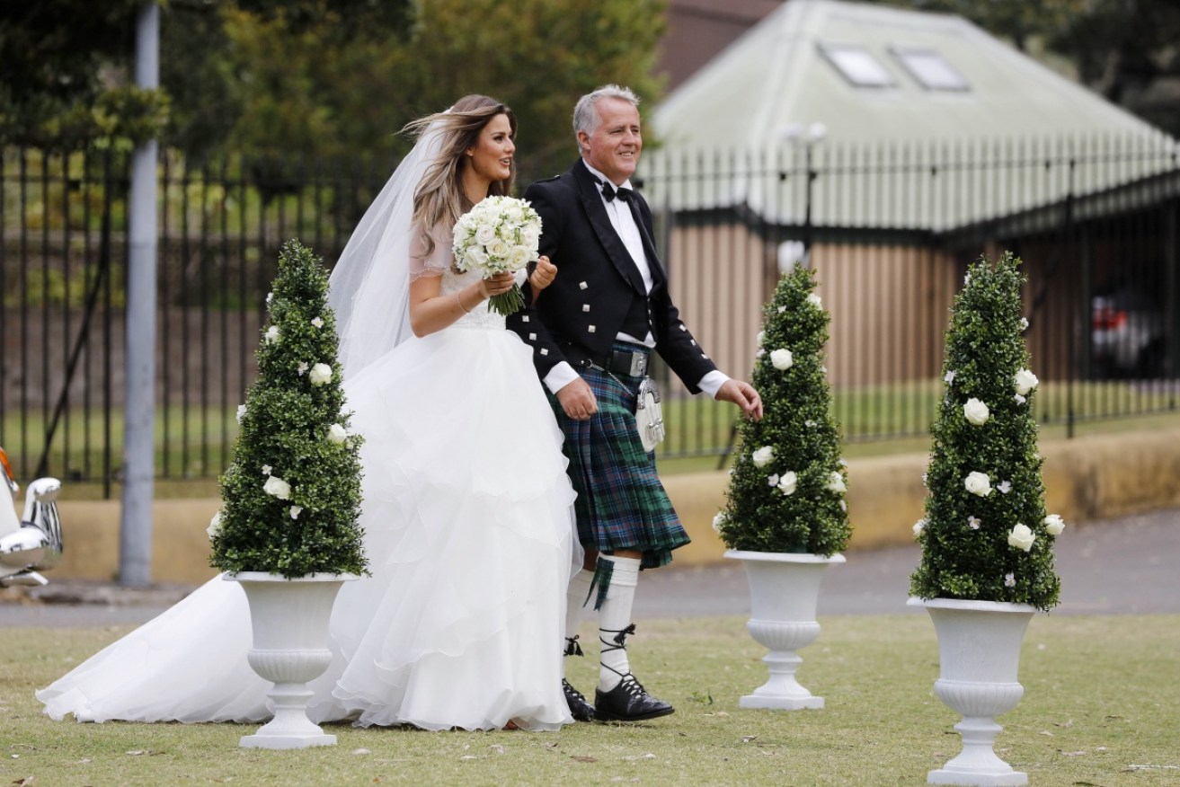Cheryl, 25, is walked down the aisle by her dad, who doesn't support her marrying a stranger.