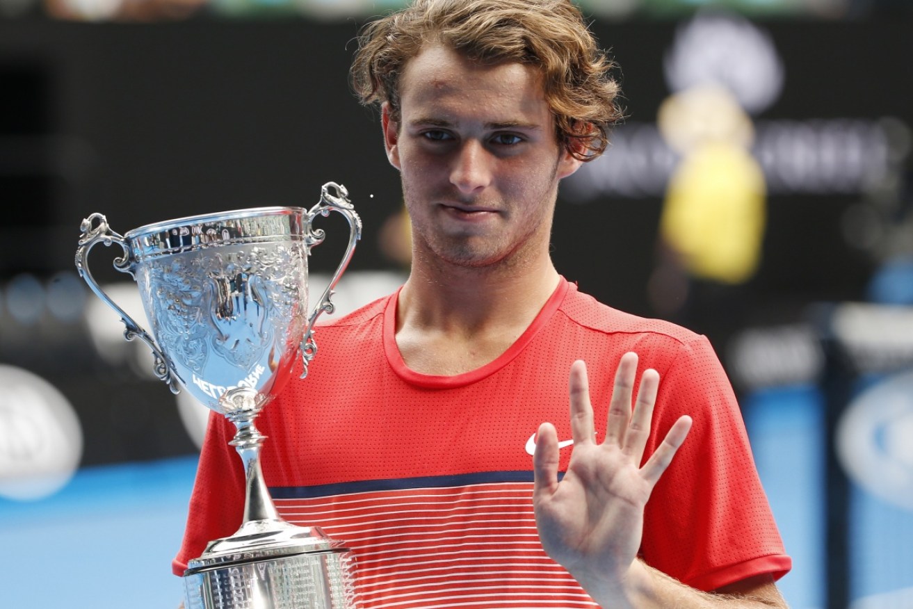 Reigning Australian Open boys champion Oliver Anderson has been charged with match-fixing.