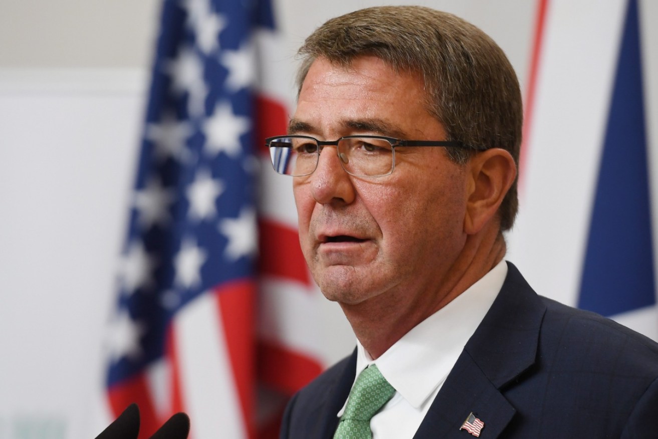 Ash Carter has signalled a warning to Russia over its suspected hacking. 