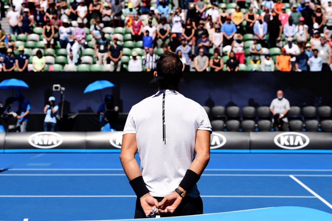 Rafael Nadal stands silent as a tribute to the victims of the CBD  car attack on Friday.