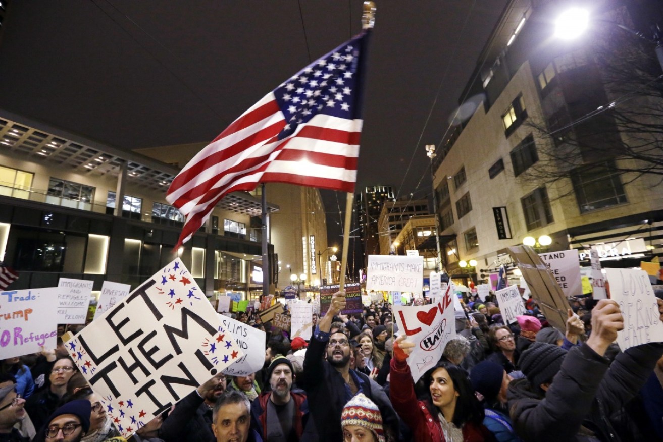 Protests erupted around the US in opposition to Mr Trump's Muslim travel ban. 