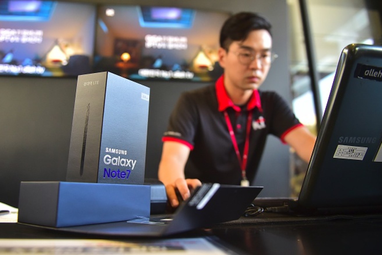 A South Korean employee works to provide replacement Samsung Galaxy Note 7.