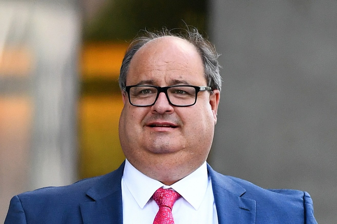 The special purpose liquidator examining the operations of  Queensland Nickel will apply for an arrest warrant for Clive Palmer's nephew and former company director Clive Mensink.