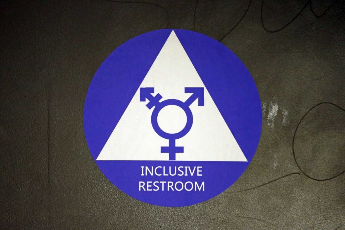 Stickers had been issued designating gender neutral bathrooms after the Obama administration's directive.
