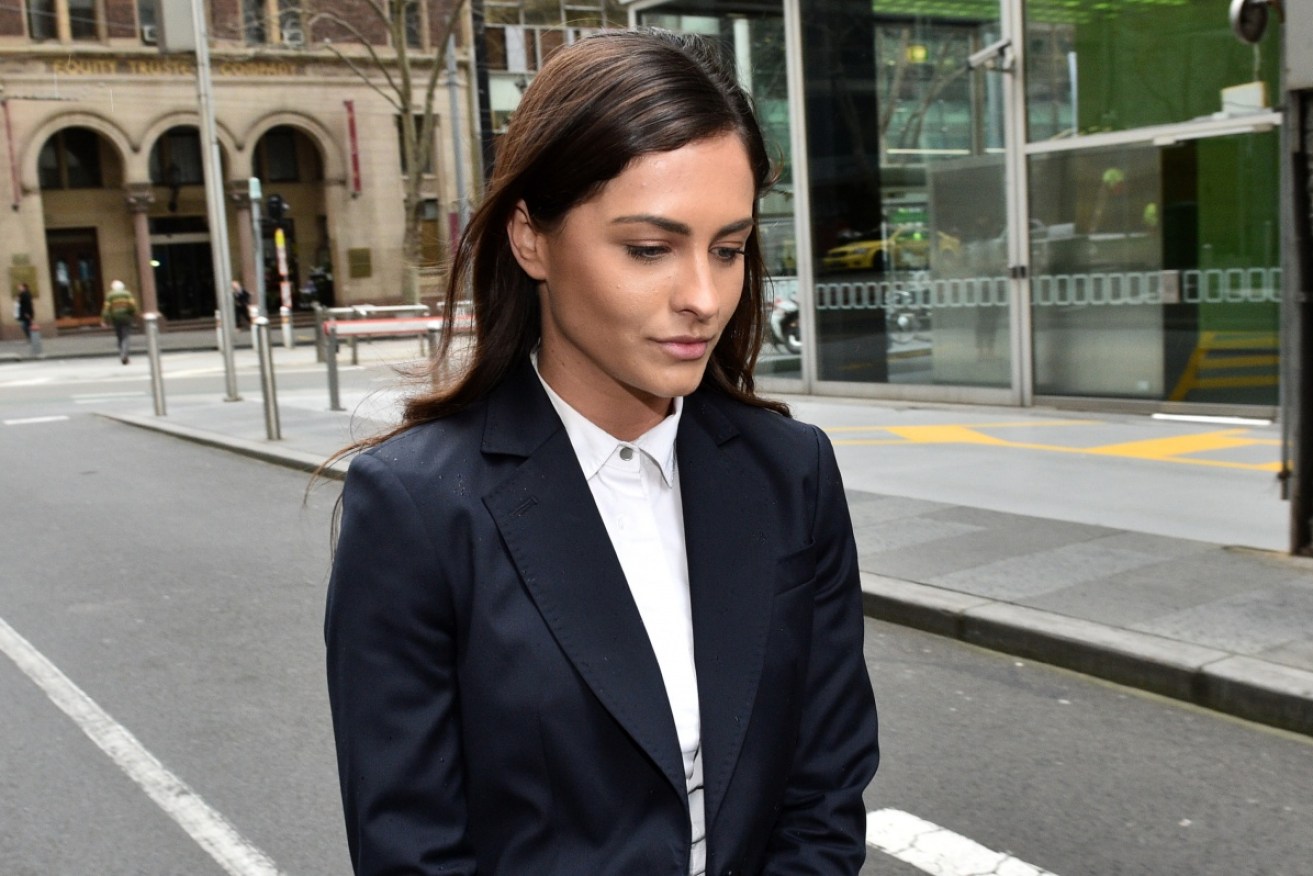 Reporter Krystal Johnson leaves the Supreme Court of Victoria in Melbourne in 2016.