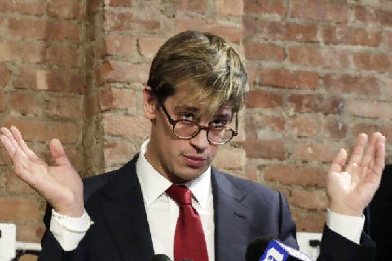 Breitbart senior editor Milo Yiannopoulos addresses the media at a press conference. 