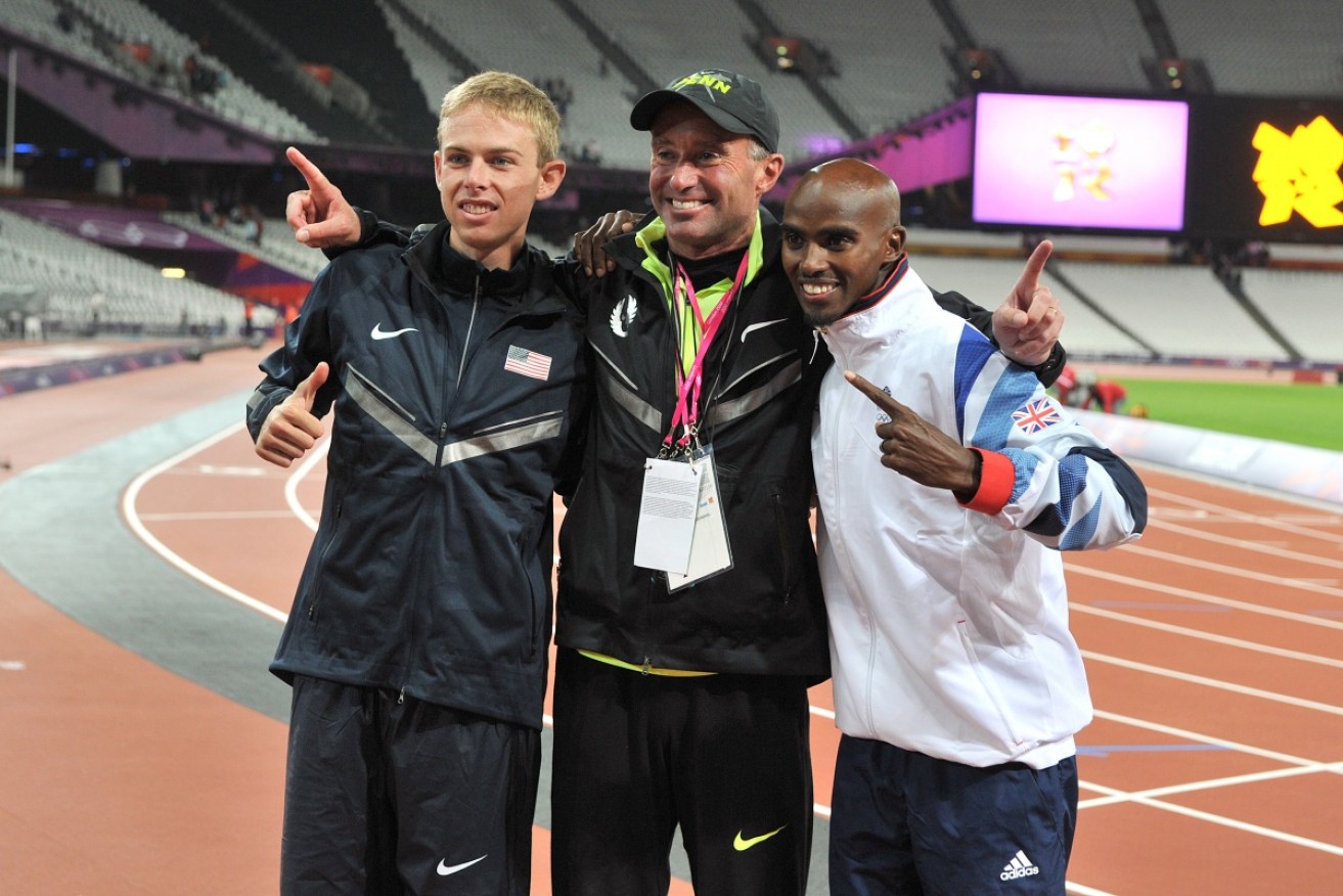 Great Britain's Mo Farah (right) celebrating winning the 10,000m final at the 2012 London Olympics with coach Alberto Salazar (centre) and the silver medalist, USA's Galen Rupp (left)