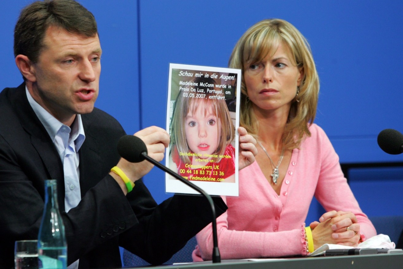 Kate and Gerry McCann display a poster of their missing daughter in 2007 in Berlin, Germany.