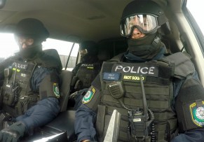 Riot squad prepare for a drug raid_e9c4a7fc