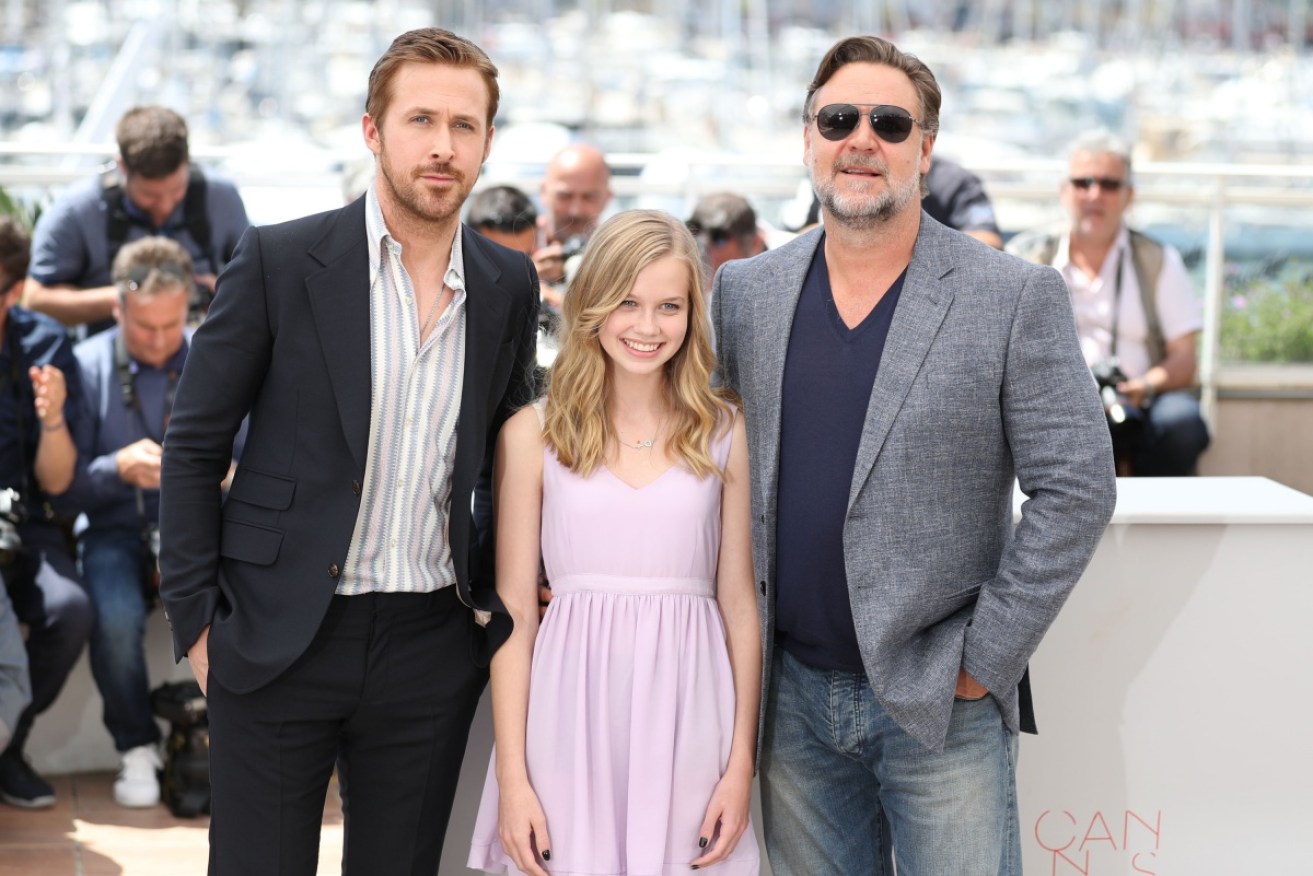 Angourie Rice looks totally at home sandwiched between major Hollywood stars Ryan Gosling (left) and Russell Crowe (right).