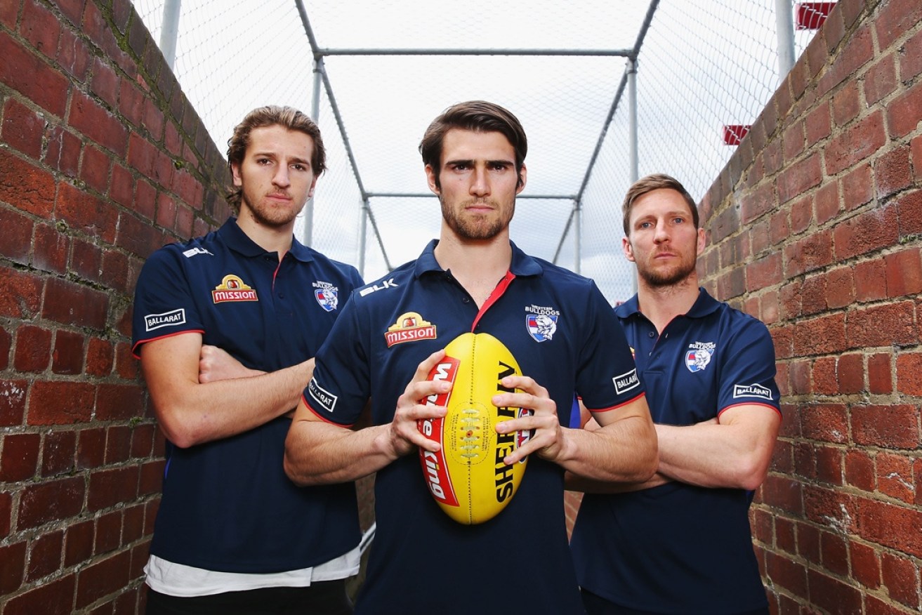 Easton Wood (centre) has hit out at the many gambling ads in sporting broadcasts.