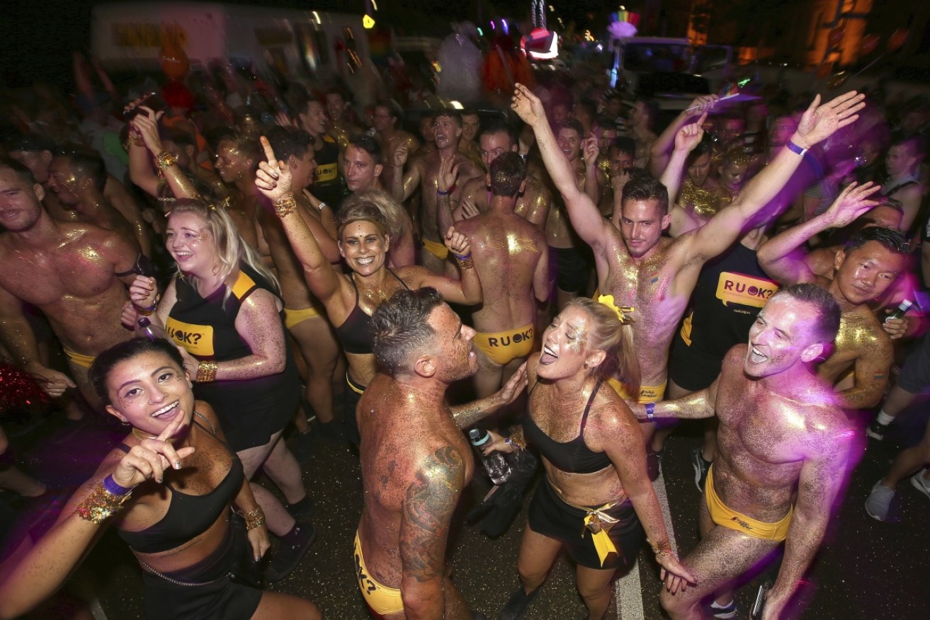 Revellers get in some serious dance moves at the  annual Gay and Lesbian Mardi Gras parade in Sydney.