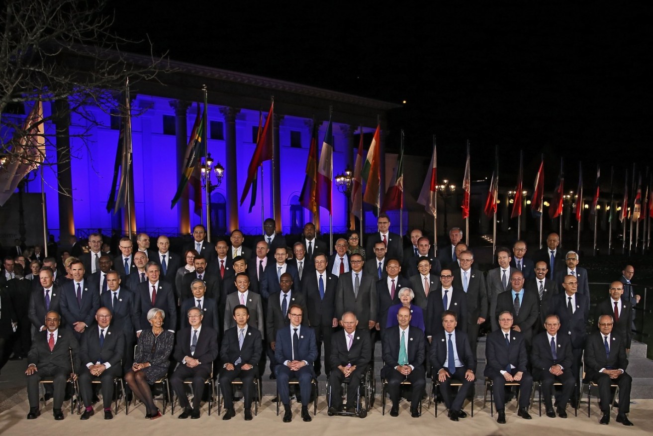 Participants in the G20 Finance Ministers and Central Bank Governors Meeting pose for a photo in Baden-Baden, Germany.