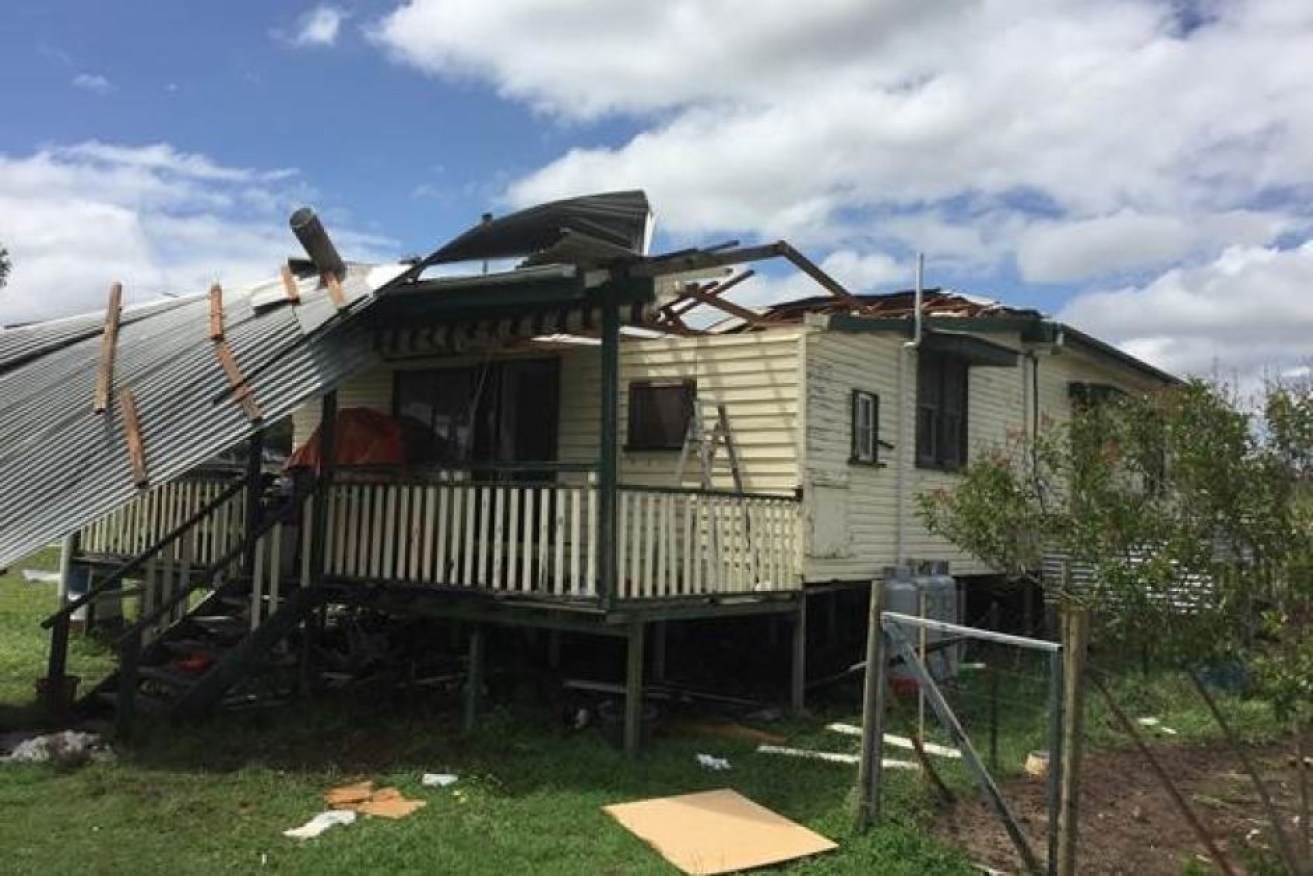 This home at Goombungee, north of Toowoomba, lost its roof in the storm.