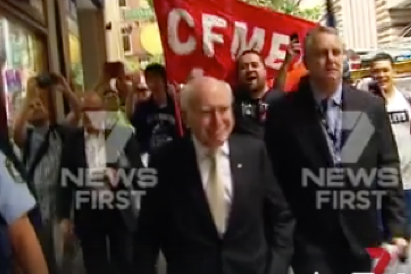 John Howard walked straight out into the middle of the protest.