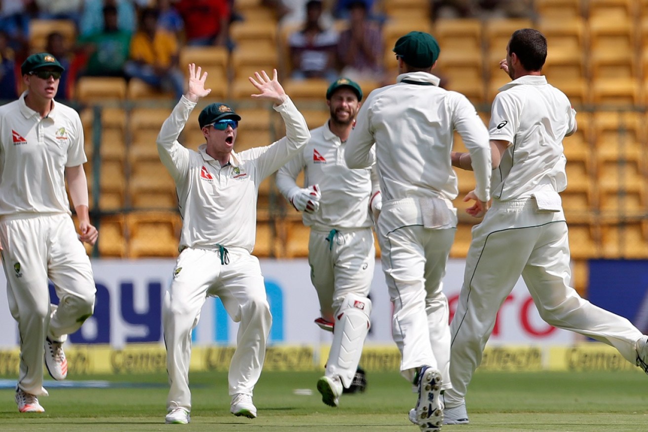 Australia celebrate one of Josh Hazlewood's wickets.