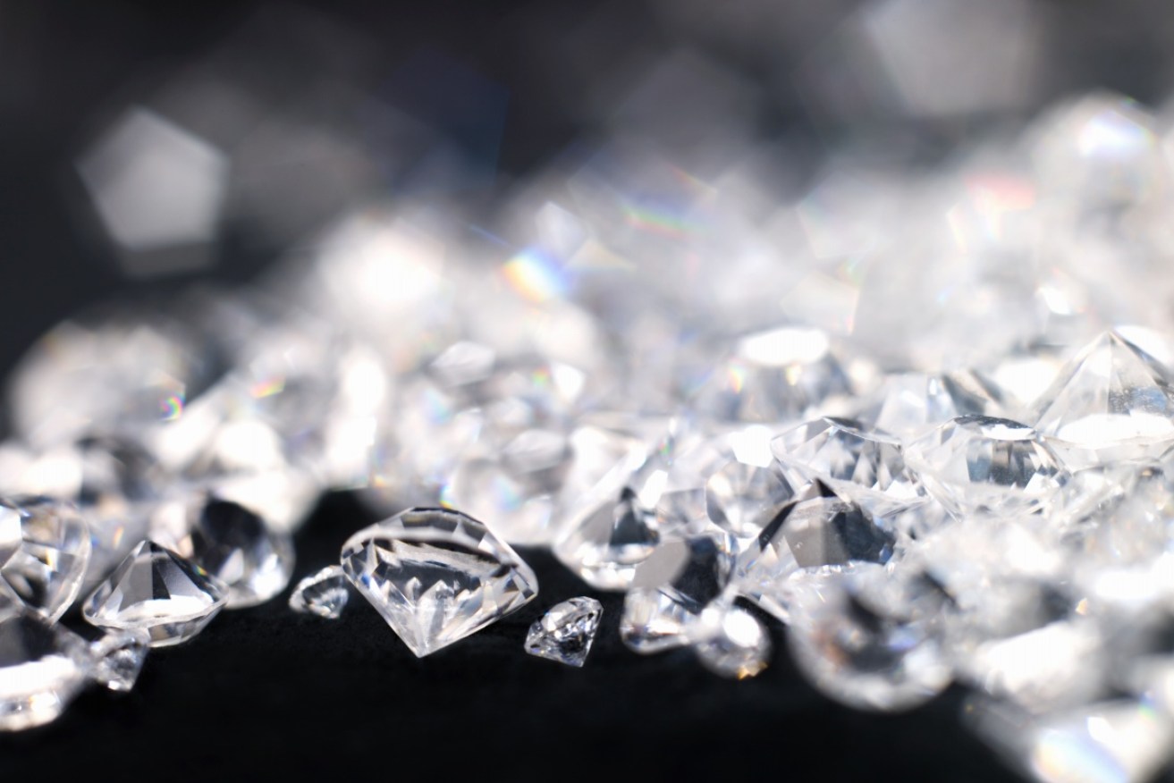 A man was caught trying to smuggle 1000 diamonds into China from Hong Kong.