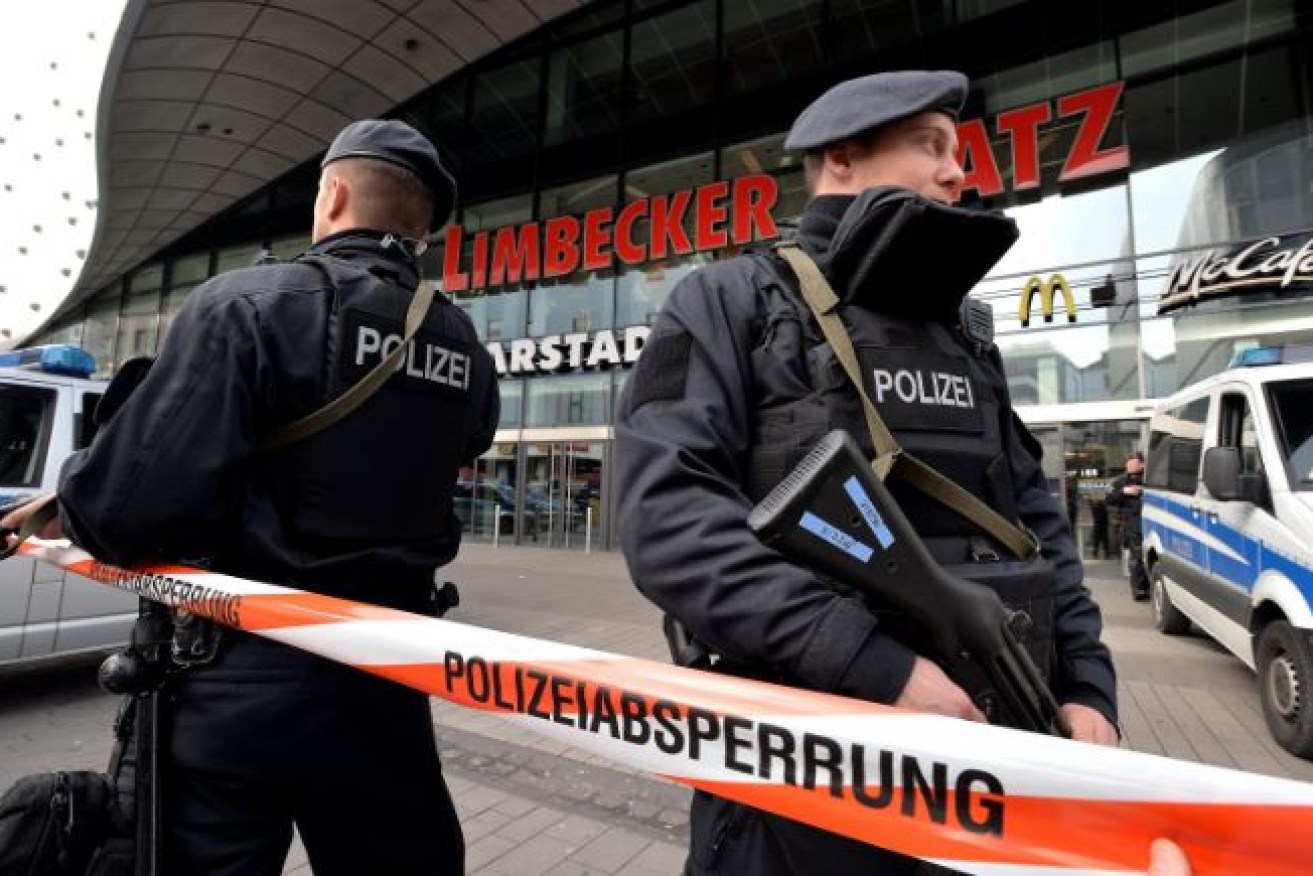 Heavily armed police  guard the Limbecker shopping center 'Limbecker Platz' in Essen, Germany, 11 Heavily armed police cordon off the Limbecker mall amid "concrete" reports of an imminent terror attack.closed due to concrete indications of an imminent attack, media reported